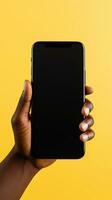 Hand holding smartphone with a black blank screen isolated on a yellow background. ai generated photo