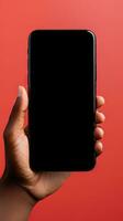 Hand holding smartphone with a black blank screen isolated on a red background. ai generated photo