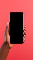 Hand holding smartphone with a black blank screen isolated on a red background. ai generated photo