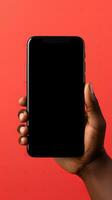 Hand holding smartphone with a black blank screen isolated on a red background. ai generated photo