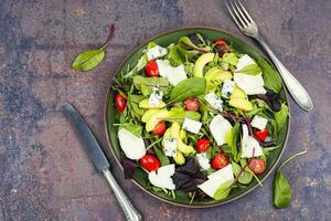 Salad of vegetables and cheese photo