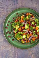 Colorful salad with fried vegetables photo
