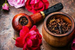 Smoking rose-flavored tobacco photo