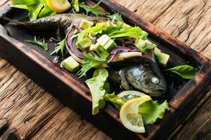 Baked fish with avocado photo