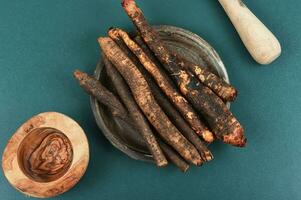 Raw salsify in herbal medicine, salsify roots. photo