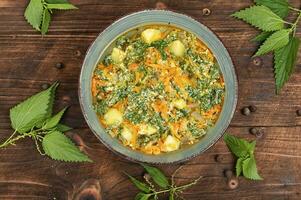 Vegan seasonal nettle soup. photo