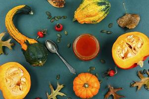 Pumpkin jam on table, autumn still life. photo