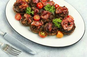 Grilled stuffed mushrooms. photo