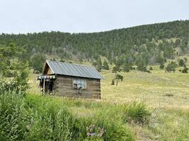 Lonely hut on the shore of Lake Baikal, Russia photo