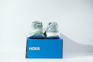 Strasbourg, France - August 2023  Hoka Bondi 8 new green running shoes and shoe box photo