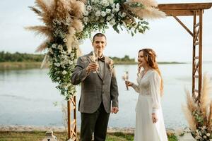 wedding ceremony of the newlyweds in a country cottage photo