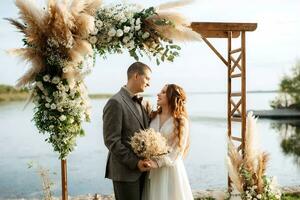 wedding ceremony of the newlyweds in a country cottage photo