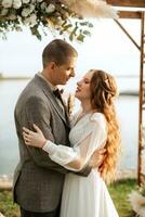 wedding ceremony of the newlyweds in a country cottage photo