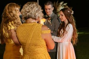 transfer of wedding fire with the help of candles the newlyweds photo