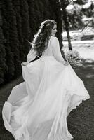 red-haired girl bride with a wedding bouquet photo