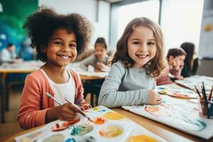 Kids painting with watercolors at school photo