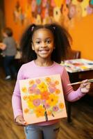 Child artist showing off their masterpiece to the camera photo