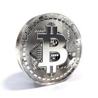Cryptocurrency silver bitcoin on a white background photo