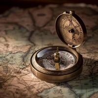 Ancient compass on an ancient map photo
