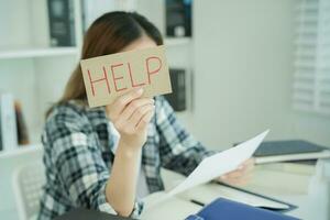 student woman have anxiety because of exams, female prepare for test and learning lessons in the library. stress, despair, haste, misunderstanding reading, discouraged, expectation, knowledge photo