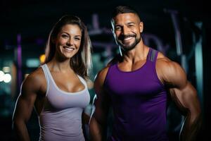 hombre y un mujer posando en el gimnasia, el atléticamente construido hombre, deportivo un barba y un radiante sonrisa. junto a a él, un de aspecto decidido mujer , exhibiendo su tonificado físico. generativo ai foto