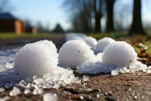 Close-up shots of hailstones of various sizes lying on the ground, showcasing the impact of their destructive force. Generative Ai photo