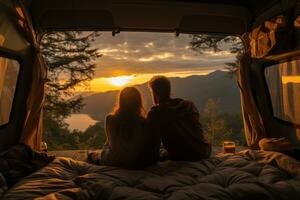 Couple watching a stunning view from the back of a van bed. Concept Van life. Generative Ai photo