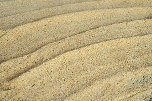 texture of sand with lined pattern photo