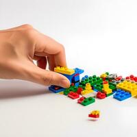 hand arranging rainbow blocks toy white background, ai generative photo