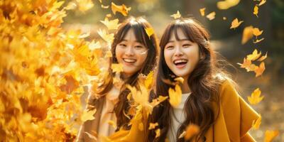 Happy Young Asia women Playing in the Fall Leaves with Space for Copyspace for text ,Generative AI. photo