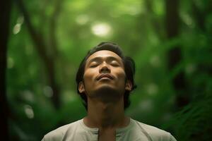 A man relaxed breathing fresh air in a green forest at natural ,Generative AI. photo