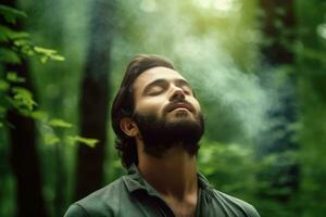 A man relaxed breathing fresh air in a green forest at natural ,Generative AI. photo