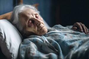 Old years woman patient sleeping on bed in hospital ward. Health care ,Generative AI. photo