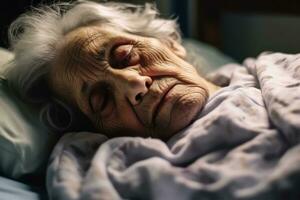 Old years woman patient sleeping on bed in hospital ward. Health care ,Generative AI. photo