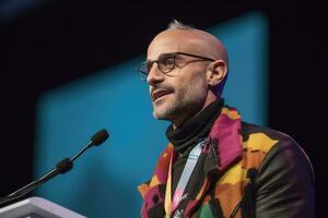 LGBTQ leader delivers a keynote address at a conference, talking about the importance of diversity,Generative AI. photo