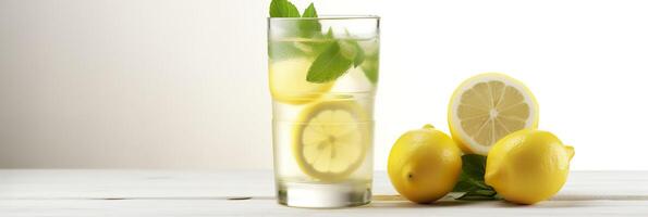 Lemonade in a glass with fresh lemons and mint. Cold summer drink with copy space. Generative AI photo