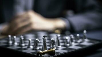 Businessman playing chess think problem solving. business competition planning teamwork,International chess, ideas and competition and strategy, business success concept,strategic concept... photo