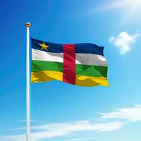 Waving flag of Central African Republic on flagpole with sky background. photo