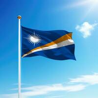 Waving flag of Marshall Islands on flagpole with sky background. photo