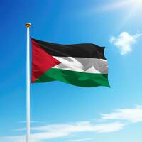 Waving flag of Palestine on flagpole with sky background. photo