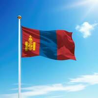 Waving flag of Mongolia on flagpole with sky background. photo