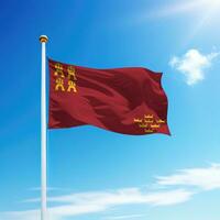 Waving flag of Murcia is a community of Spain on flagpole photo