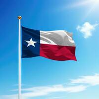 Waving flag of Texas is a state of United States on flagpole photo