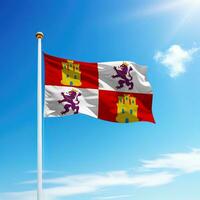 Waving flag of Castile and Leon is a community of Spain on flagpole photo