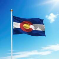 Waving flag of Colorado is a state of United States on flagpole photo