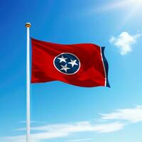 Waving flag of Tennessee is a state of United States on flagpole photo