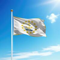 Waving flag of Rhode Island is a state of United States on flagpole photo