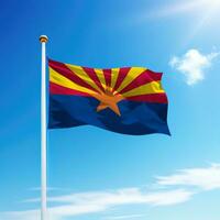 Waving flag of Arizona is a state of United States on flagpole photo