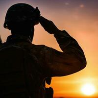 Silhouette Of A Soldier Saluting During Sunset AI Generated photo