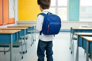 Back view of a schoolboy with a backpack standing in the classroom.  AI Generative Pro Photo